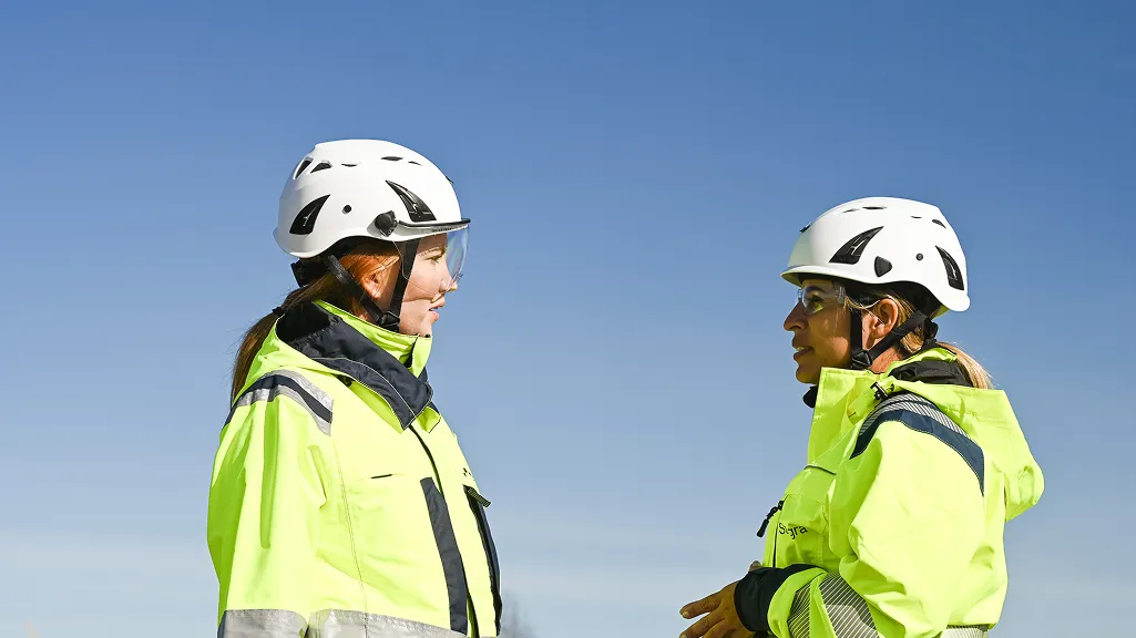 A Woman in a Hard Hats and High Visibility Jacket