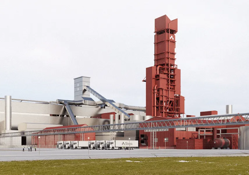 A large steel plant with white heavy goods vehicles in front