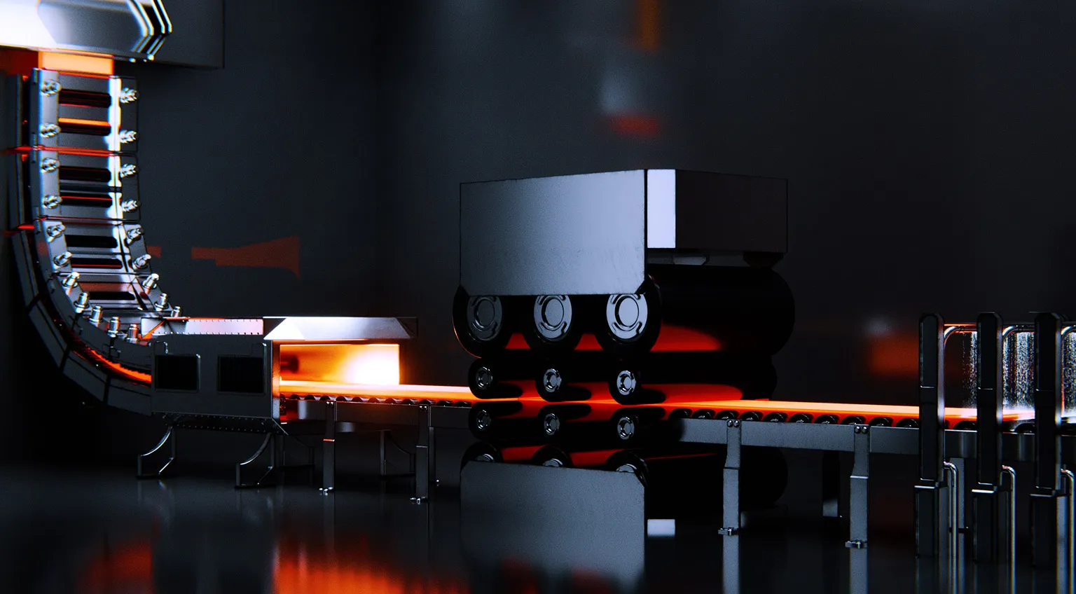 Darkly-lit mechanical equipment on a production line